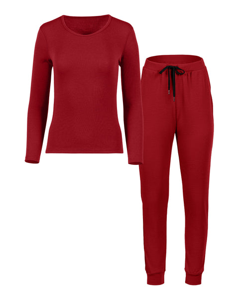 Packshot of women&#39;s long sleeve and joggers set in the color royal cherry
