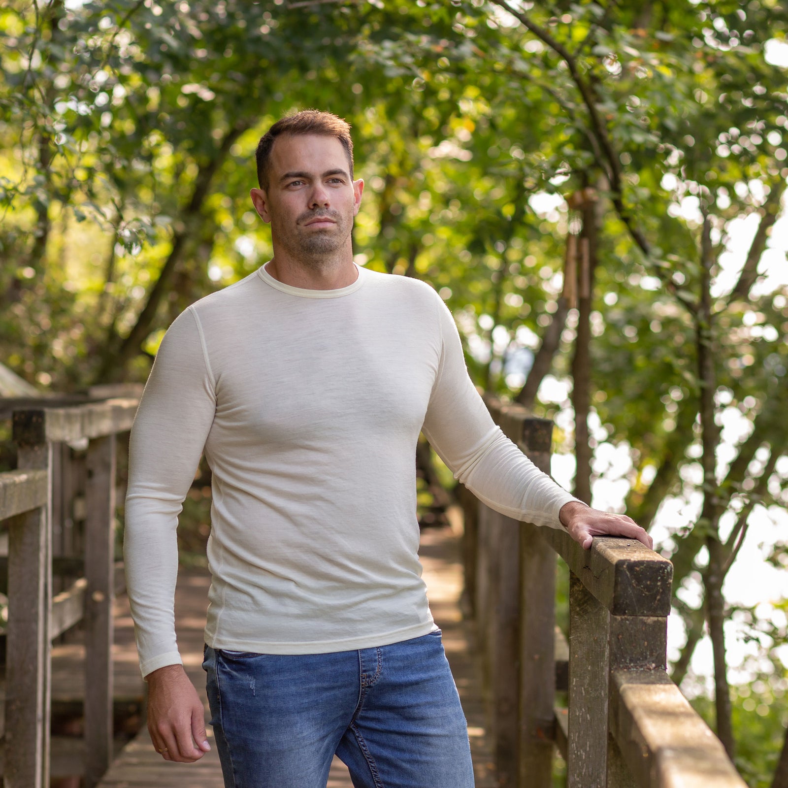Man running outdoors on a blurred natural background
