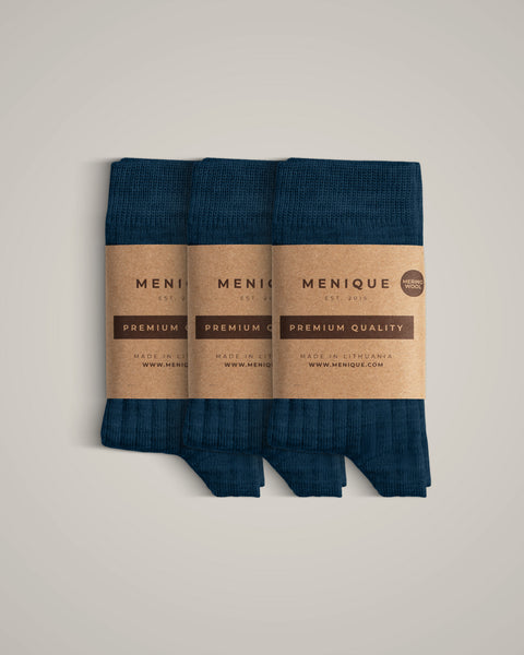 A 3-pack of kids’ dark blue ribbed merino wool socks with “Menique Premium Quality” labels.