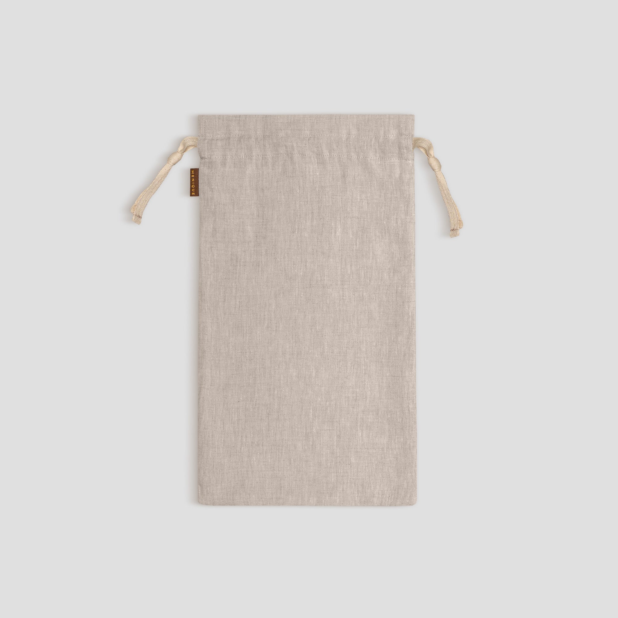 Stone Green drawstring bag on a light gray background