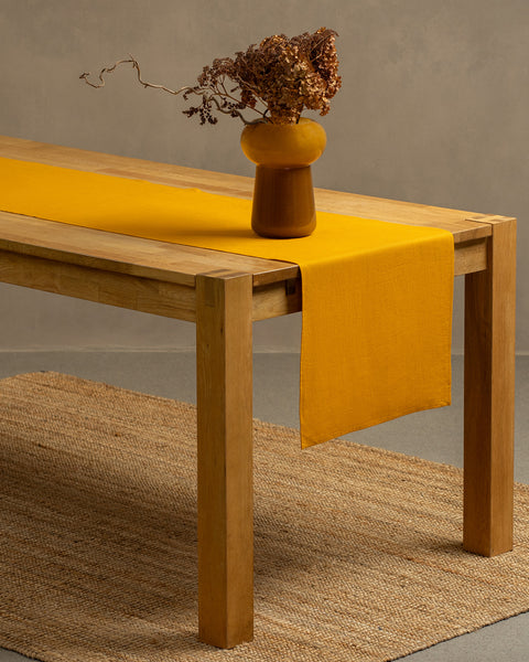 The menique spicy yellow linen table runner. 