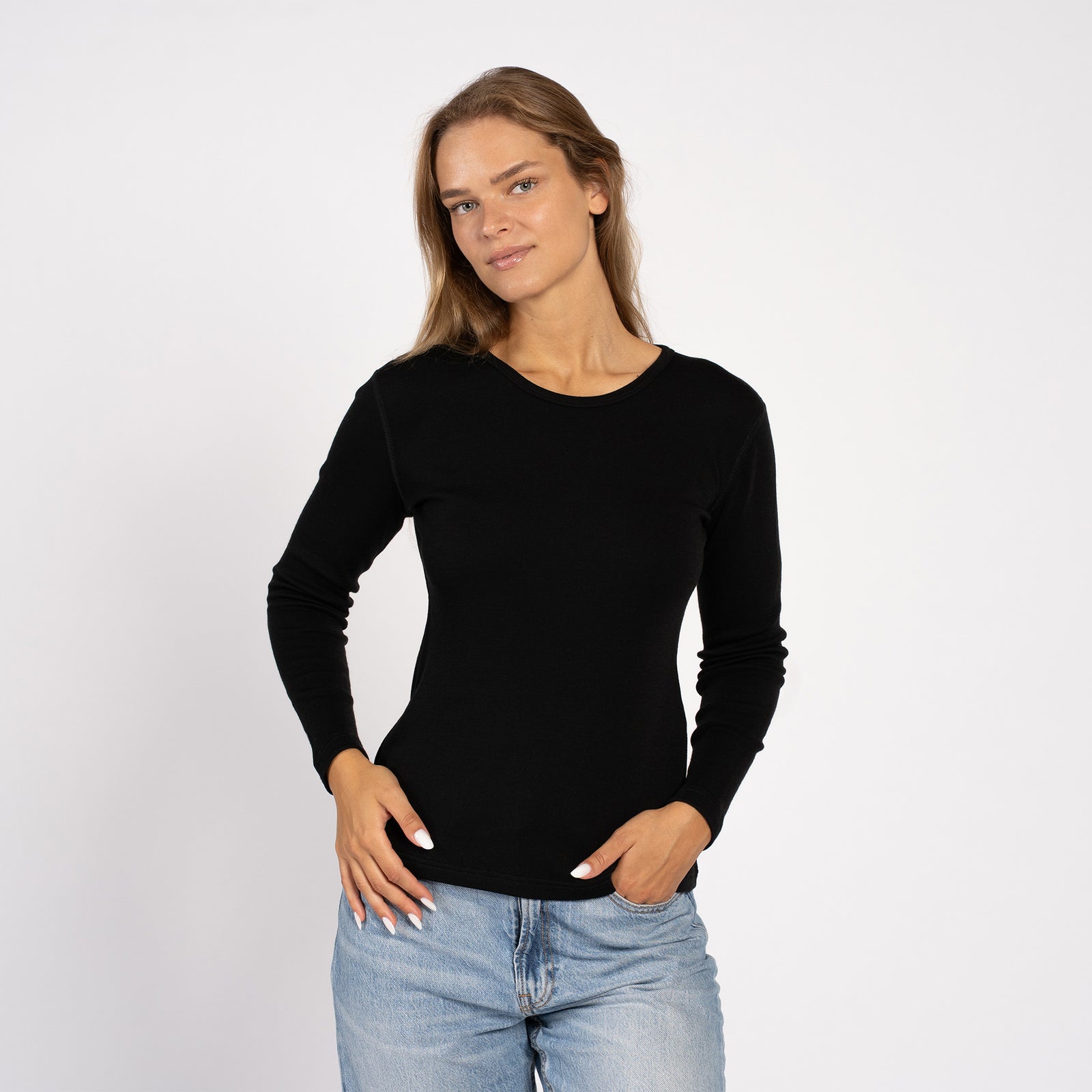 Front view of women’s long sleeve thermal shirt in black – 250 Merino wool base layer