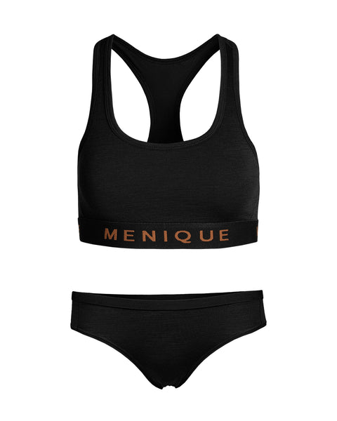 A flat-lay product shot of a matching women's underwear set in solid black, displayed against a pure white background. The set includes a racerback sports bralette and bikini-style briefs. Both pieces feature a black elastic band with the brand name "MENIQUE" woven in light brown text.